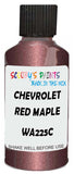 Detail brush applying Red Metallic to a small door scratch on an Chevrolet Tahoe, clean OEM finish