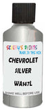 Detail brush applying Silver Metallic to a small door scratch on an Chevrolet Ssr, clean OEM finish