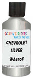 Detail brush applying Silver Metallic to a small door scratch on an Chevrolet Tracker, clean OEM finish