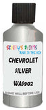 Detail brush applying Silver Metallic to a small door scratch on an Chevrolet Trucks, clean OEM finish