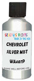 Detail brush applying Silver Metallic to a small door scratch on an Chevrolet Trailblazer, clean OEM finish