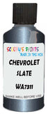 Detail brush applying Grey Metallic to a small door scratch on an Chevrolet Trucks, clean OEM finish
