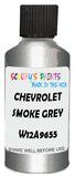 Detail brush applying Grey Metallic to a small door scratch on an Chevrolet Trucks, clean OEM finish