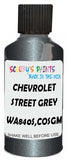 Detail brush applying Grey Metallic to a small door scratch on an Chevrolet Cruze, clean OEM finish