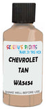 Detail brush applying Beige Solid to a small door scratch on an Chevrolet Suburban, clean OEM finish