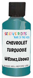 Detail brush applying Blue Metallic to a small door scratch on an Chevrolet Trucks, clean OEM finish