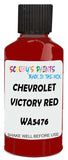 Detail brush applying Red Solid to a small door scratch on an Chevrolet Trucks, clean OEM finish