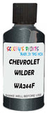 Detail brush applying Grey Metallic to a small door scratch on an Chevrolet Tahoe, clean OEM finish