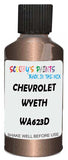 Detail brush applying Brown Metallic to a small door scratch on an Chevrolet Cruze, clean OEM finish