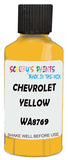 Detail brush applying Yellow Solid to a small door scratch on an Chevrolet Corvette, clean OEM finish