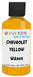 Detail brush applying Yellow Solid to a small door scratch on an Chevrolet Colorado, clean OEM finish
