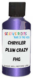 Detail brush applying Purple Metallic to a small door scratch on an Chrysler 300 Series, clean OEM finish