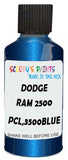 Detail brush applying Blue Metallic to a small door scratch on an Dodge Ram 2500/3500, clean OEM finish