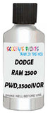 Detail brush applying White Metallic to a small door scratch on an Dodge Ram 2500/3500, clean OEM finish