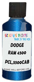 Detail brush applying Blue Metallic to a small door scratch on an Dodge Ram 4500/5500 Cab, clean OEM finish