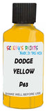 Detail brush applying Yellow Solid to a small door scratch on an Dodge Ram, clean OEM finish