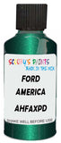 Detail brush applying Green Metallic to a small door scratch on an Ford F-150, clean OEM finish
