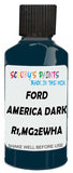 Detail brush applying Brown Solid to a small door scratch on an Ford F-150, clean OEM finish