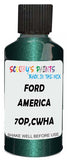 Detail brush applying Green Metallic to a small door scratch on an Ford F-150, clean OEM finish