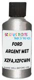 Detail brush applying Grey Metallic to a small door scratch on an Ford F-Series, clean OEM finish