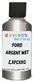 Detail brush applying Grey Metallic to a small door scratch on an Ford F-Series, clean OEM finish
