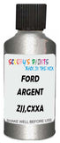 Detail brush applying Grey Metallic to a small door scratch on an Ford Ranger, clean OEM finish