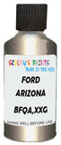 Detail brush applying Beige Metallic to a small door scratch on an Ford Excursion, clean OEM finish