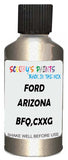 Detail brush applying Beige Metallic to a small door scratch on an Ford Freestyle, clean OEM finish