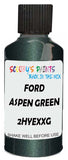 Detail brush applying Green Metallic to a small door scratch on an Ford Expedition, clean OEM finish