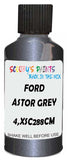Detail brush applying Grey Metallic to a small door scratch on an Ford Scoop, clean OEM finish