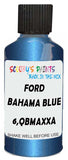 Detail brush applying Blue Metallic to a small door scratch on an Ford F-Series, clean OEM finish