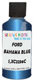 Detail brush applying Blue Metallic to a small door scratch on an Ford Orion, clean OEM finish