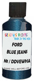 Detail brush applying Blue Metallic to a small door scratch on an Ford F-Series F-250/550 Lariet, clean OEM finish