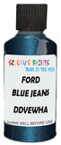 Detail brush applying Blue Metallic to a small door scratch on an Ford Focus, clean OEM finish