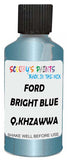 Detail brush applying Blue Metallic to a small door scratch on an Ford Focus, clean OEM finish