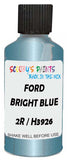 Detail brush applying Blue Metallic to a small door scratch on an Ford Festiva, clean OEM finish
