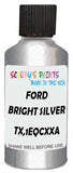 Detail brush applying Silver Metallic to a small door scratch on an Ford F-Series, clean OEM finish