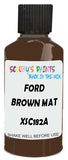 Detail brush applying Brown Solid to a small door scratch on an Ford Scoop, clean OEM finish