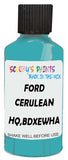 Detail brush applying Blue Solid to a small door scratch on an Ford Flex, clean OEM finish