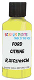 Detail brush applying Yellow Solid to a small door scratch on an Ford Sierra, clean OEM finish