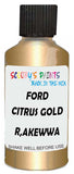 Detail brush applying Gold Metallic to a small door scratch on an Ford Fiesta, clean OEM finish