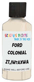 Detail brush applying White Solid to a small door scratch on an Ford F-Series, clean OEM finish