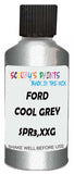Detail brush applying Grey Metallic to a small door scratch on an Ford Explorer, clean OEM finish
