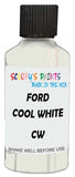 Detail brush applying White Solid to a small door scratch on an Ford Australia Fiesta, clean OEM finish