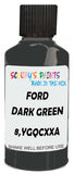 Detail brush applying Green Solid to a small door scratch on an Ford Bronco, clean OEM finish