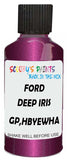 Detail brush applying Pink Metallic to a small door scratch on an Ford Escort, clean OEM finish