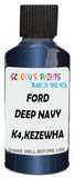 Detail brush applying Blue Metallic to a small door scratch on an Ford Taurus, clean OEM finish