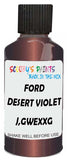 Detail brush applying Purple Metallic to a small door scratch on an Ford Explorer, clean OEM finish