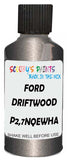 Detail brush applying Grey Metallic to a small door scratch on an Ford Crown Victoria, clean OEM finish