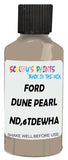 Detail brush applying Beige Solid to a small door scratch on an Ford Escape, clean OEM finish
